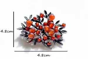 Vintage branch red stone brooch, elegant retro sweater pin and scarf buckle accessory.
