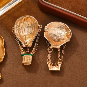 Vintage gold hot air balloon brooch pin, elegant enamel sweater accessory for women