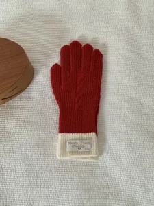 Red and white color block knit gloves for winter warm daily wear and touch screen use.