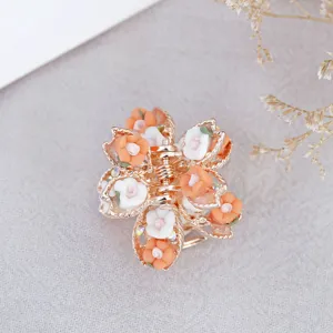 Vintage mini metal hair claw clip with cute soft clay rose flowers for women daily hair styling.