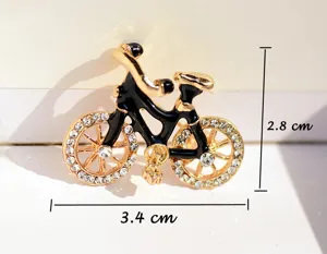 Exquisite rhinestone bicycle brooch pin, retro enamel detail, perfect jacket and bag accessory.