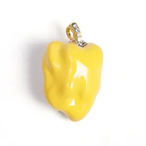 Creative yellow pepper brooch with enamel and sparkling rhinestones, stylish coat accessory.