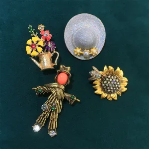 Vintage pastoral sunflower brooch detail, creative scarecrow and hat pin accessory for women.