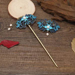 Cloisonne style floral hairpin and hair clip detail shot with freshwater pearls and tassels.