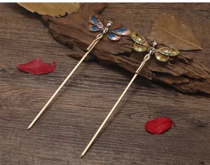 Retro glaze dragonfly hairpin detail, vintage copper hair stick, elegant styling accessory.