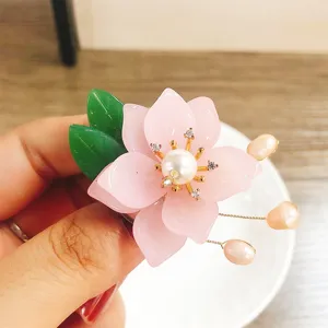 Elegant imitation colored glaze flower brooch with natural freshwater pearl and green leaves for women.