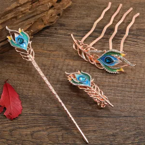 Detailed view of vintage peacock feather hair clip and hairpin set, featuring delicate rhinestones.