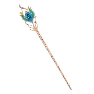 Vintage peacock feather metal hair stick with rhinestones and enamel, main display view.