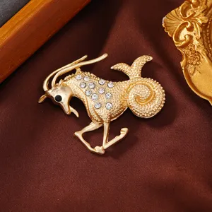 Matte gold zodiac animal brooch elegant rhinestone pin for women clothing accessories.