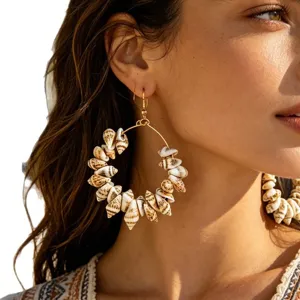 Bohemian style hoop earrings featuring natural seashells and conches for beach wear.