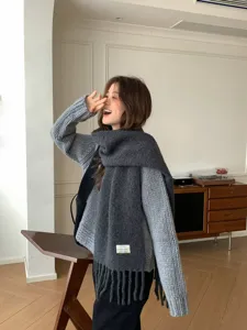 Cozy winter wool blend scarf for women, thick warm tassel shawl with stylish daily look.