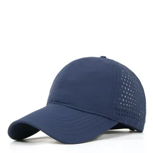 Closeup of breathable navy baseball cap with laser cut side ventilation holes for sports.