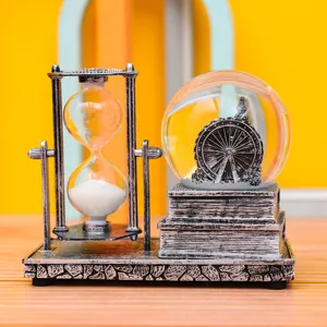 Retro creative desktop ornament combining an hourglass and a ferris wheel snow globe.