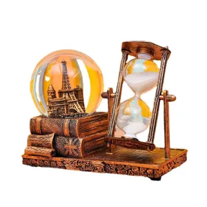 Vintage Eiffel Tower snow globe and hourglass desktop ornament resin retro book decor