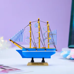 Dekoratives Miniatur Segelboot Modell blaues nautisches Tischornament Geschenk fuer Freunde.