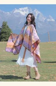 Colorful zigzag ethnic style warm cape shawl detail view, perfect for winter outfits.
