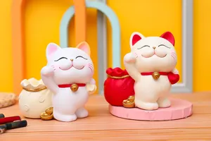 Creative festive cat resin piggy bank pen holder detail shot, cute home decor storage ornament.