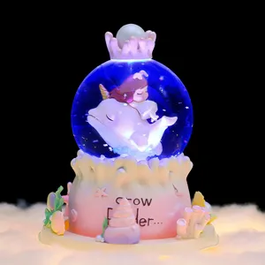 Bola de nieve delfín niña caja de música océano estrellado regalo de resina brillante.