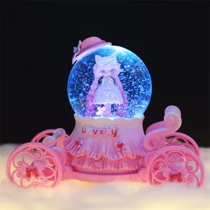 Boule à neige carrosse rose avec lumières colorées et musique, jolie boîte à musique princesse fille.