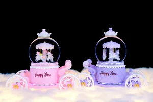 Carousel unicorn carriage crystal ball music box detailed shot showing exquisite design and dreamy lighting.
