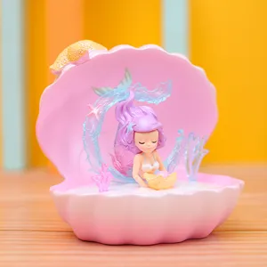 Lindo adorno de sirena princesa con concha rosa con salpicaduras de agua para regalo de cumpleaños.