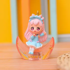 Close-up detail of the cute anime resin girl figurine sitting on translucent moon light.