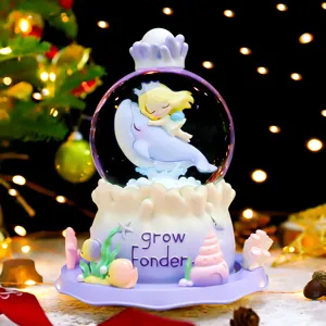 Caja de musica de bola de nieve oceano con delfin y nina para decoracion de escritorio