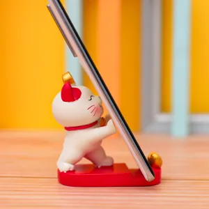 Cute lucky cat mobile phone stand desktop lazy bracket creative cartoon gift home decor accessories.