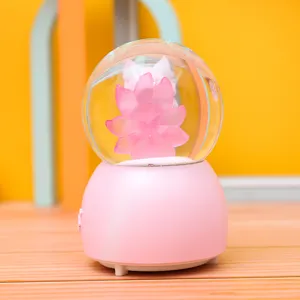 Caja de música de bola de nieve zorro de nueve colas rosa, decoración de escritorio.