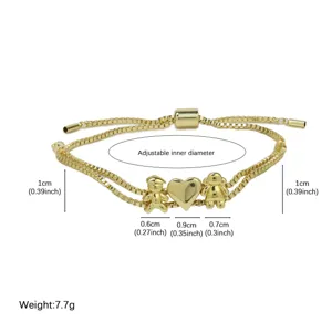 Bracelet charms famille plaqué or avec fermoir coulissant réglable et dimensions.