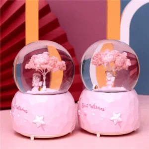 Pink snow globe night light with angel cherry tree figurine, romantic Valentine gift home decor.