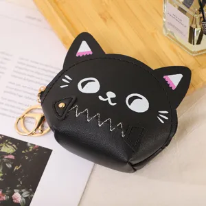 Detailed shot of a cute black cat coin purse with zipper mouth and metal keychain.