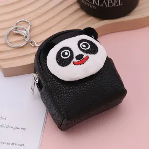 Cute mini panda backpack keychain, detailed embroidery close-up, versatile coin purse.