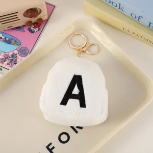 Cute mini letter plush backpack coin purse keychain, soft white stuffed bag charm pendant.