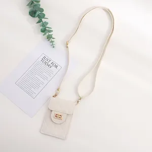 Stylish women crossbody phone bag quilted mini shoulder bag with metal lock and strap.