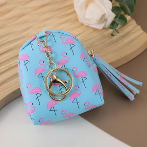 Lindo mini mochila monedero de flamenco con llavero dorado para mujeres y niños.
