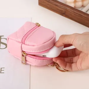 Mini quilted backpack keychain pouch for wireless earphones, cute pink PU leather coin purse.