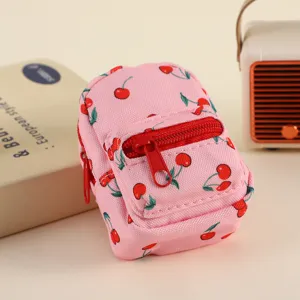 Cute cherry pattern mini backpack coin purse, portable earphone bag, stylish accessory.