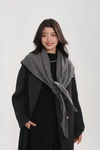 Detail view of women autumn winter pure wool triangle scarf shawl, minimalist warm wrap.