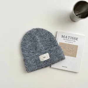 Gorro de punto gris para niños, cálido gorro de invierno de lana con etiqueta, estilo diario.