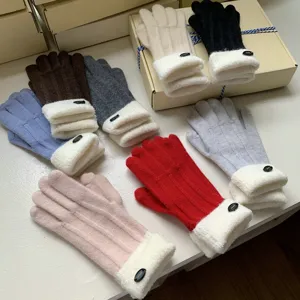 Warm winter knitted gloves with plush cuffs and delicate buttons, soft touch and cozy wear for women.