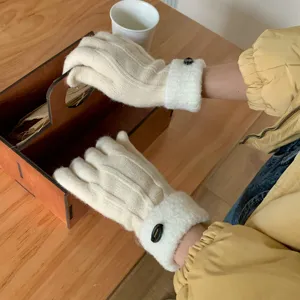 Cozy winter knit touchscreen gloves with plush cuffs and warm wool style for cold days winter wear.