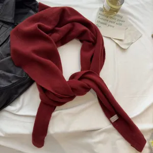 Detailed view of women's pure wool warm long scarf shawl, dark red minimalist style.