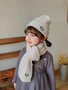 Children autumn winter warm knitted hat and scarf set with cute smile embroidery design.