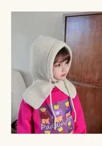 Children knitted balaclava hood detail, warm ear protection winter hat scarf in beige.