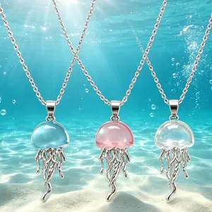 Detailed view of exquisite jellyfish pendant necklace, featuring delicate silver chains.