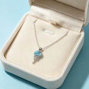 Exquisite silver jellyfish pendant necklace in a velvet box, romantic summer beach accessory.