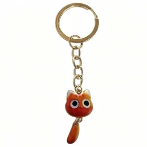 Cute Big-Eyed Cat Keychain Gold Tone Alloy Bag Charm with Moving Tail Pendant Accessory