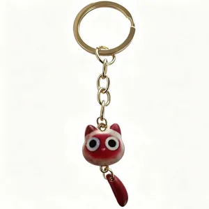 Cute red cat metal keychain with big eyes and dangling tail pendant for girls accessories.