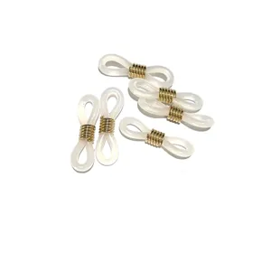 Vue détaillée des connecteurs de chaînes de lunettes en silicone avec bobines dorées pour bricolage.